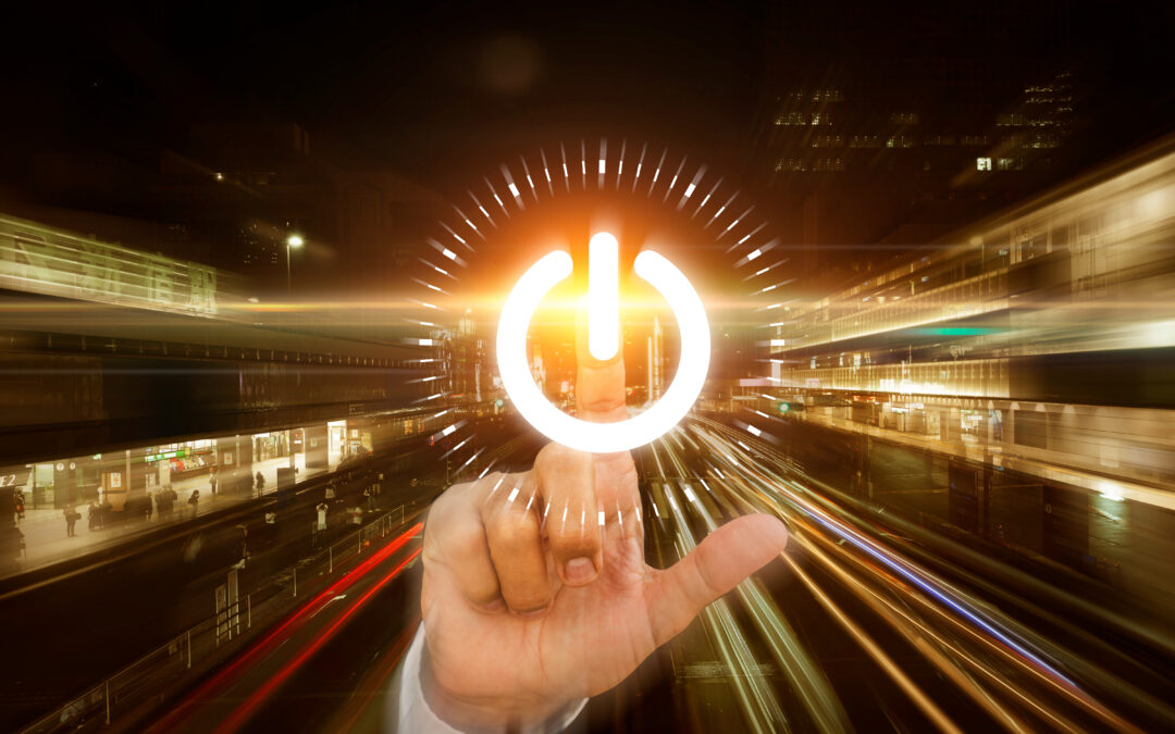 On-knapp med byggnader i bakgrunden